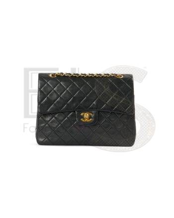 High-quality product photo of a Chanel 2.55 Vertical Vintage Timeless Black in Black