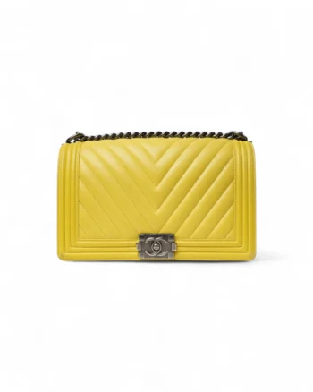 High-quality product photo of a Chanel Boy Medium Chevron Yellow in Yellow