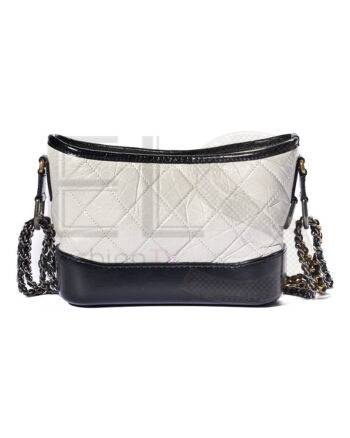 High-quality product photo of a Chanel Gabrielle Mini Bicolor White Black in White