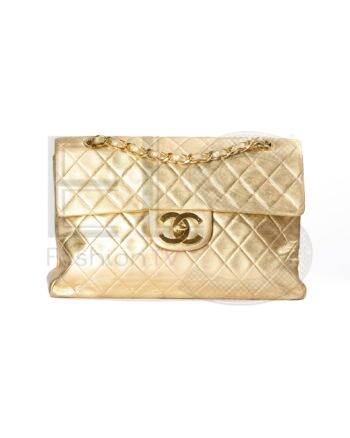 High-quality product photo of a Chanel Maxi Jumbo Big Logo Gold in Gold