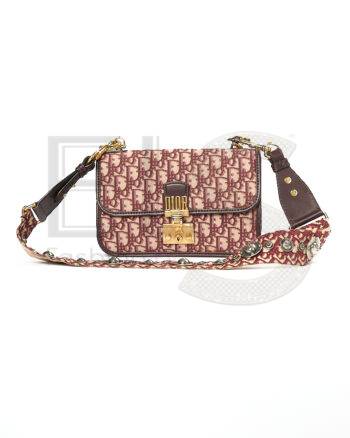High-quality product photo of a Dior Dioraddict Flap Medium Oblique Bordeaux in Bordeaux