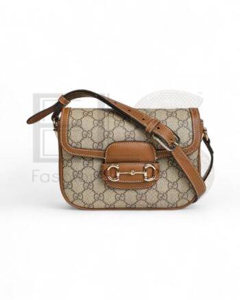 High-quality product photo of a Gucci Horsebit 1955 Mini GG Supreme Brown in Brown