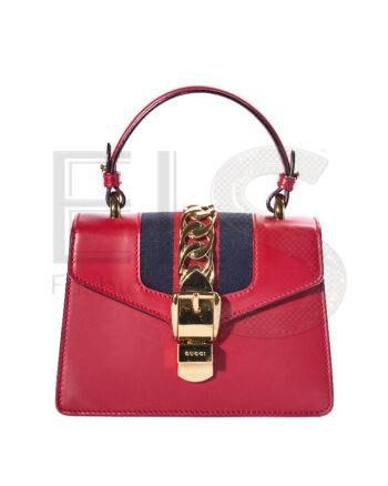 High-quality product photo of a Gucci Sylvie Mini Web Red in Red