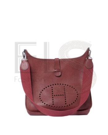High-quality product photo of a Hermès Sac Evelyne 33 Togo Rouge in Red
