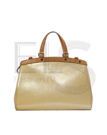 High-quality product photo of a Louis Vuitton Brea MM Yellow Patent in Yellow