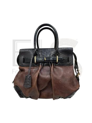 High-quality product photo of a Louis Vuitton Les Extraordinaires L.E. in Bordeaux
