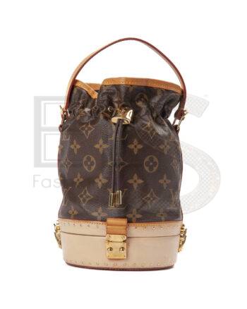 High-quality product photo of a Louis Vuitton Petit Noe Trunk BB Monogram in Brown