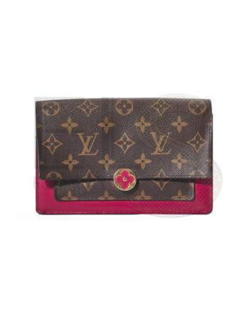 High-quality product photo of a Louis Vuitton Pochette Flore PM Monogram Fuchsia in Brown