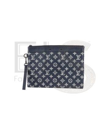 High-quality product photo of a Louis Vuitton Pochette To-Go PM Monogram Shadown in Blue